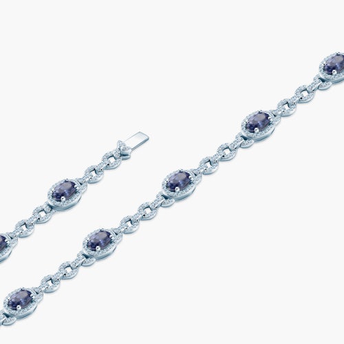 Bransoletka tenisowa SAVICKI: białe złoto, diamenty, tanzanity